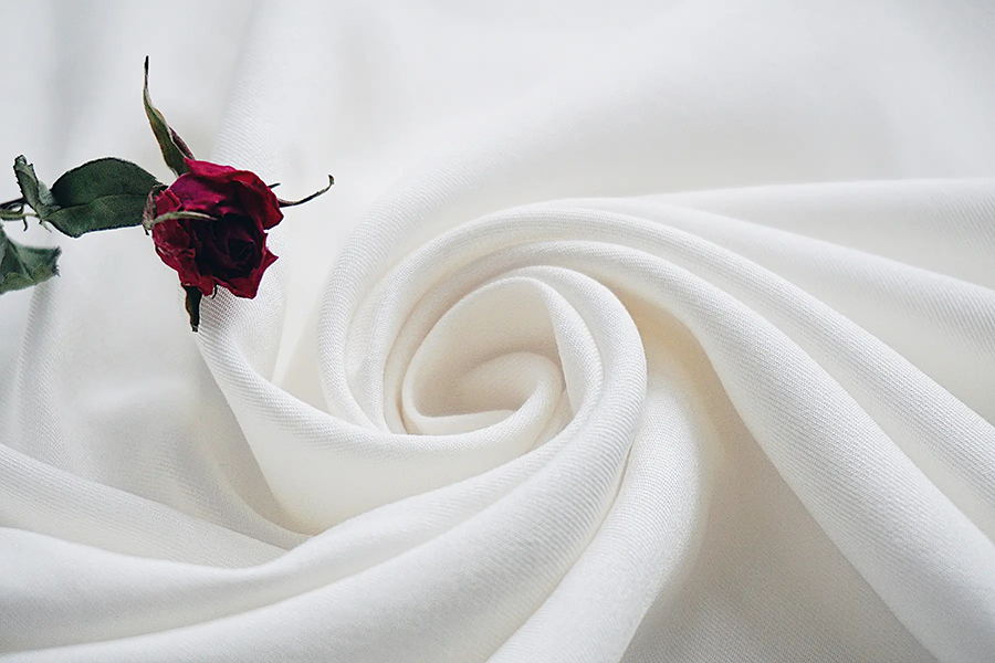 Feidhm ghreamaitheach PUR Hot Melt: Teicstíle